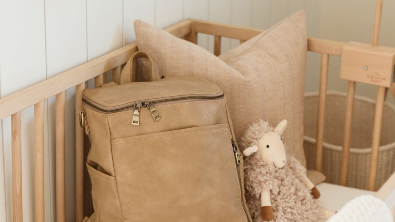 Diaper bag packed with hospital bag essentials for mom and baby