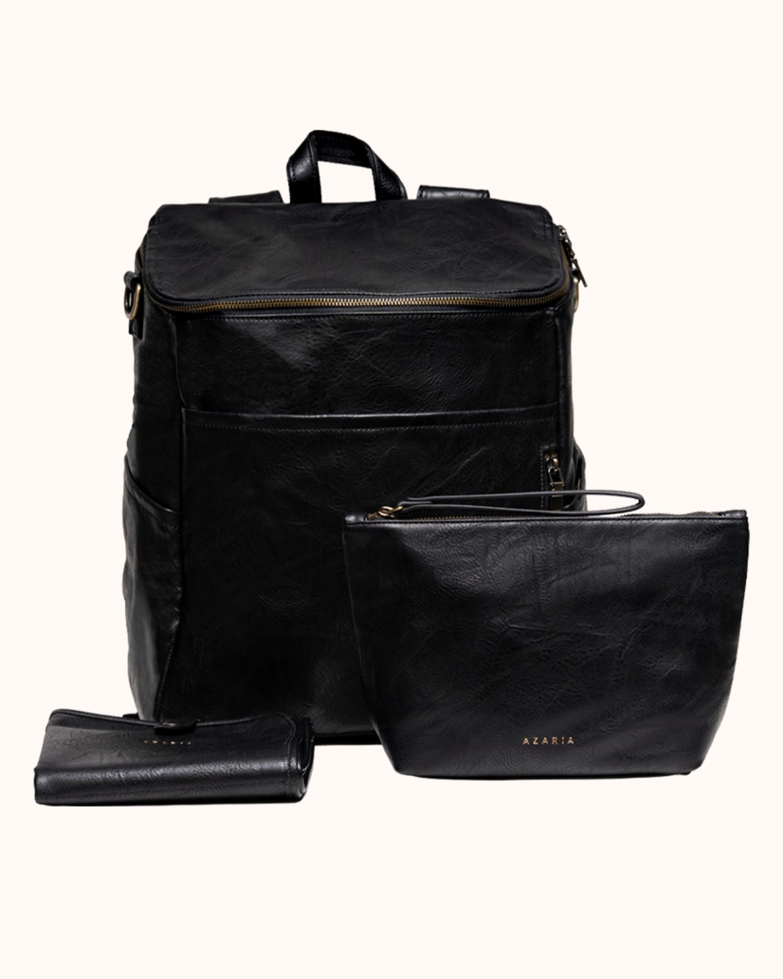 Black leather backpack and clutch set on a white background