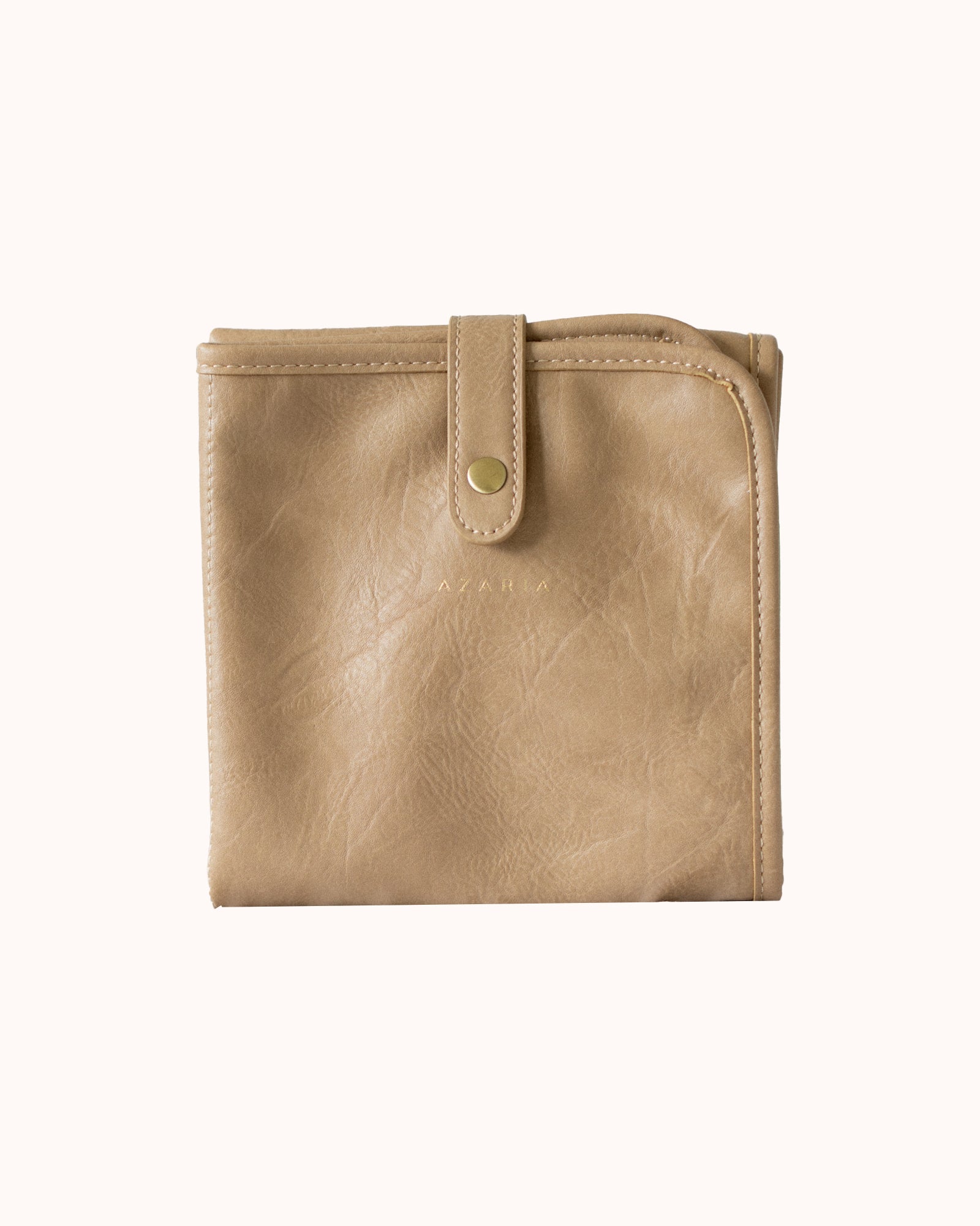 taupe vegan leather baby changing mat on white background
