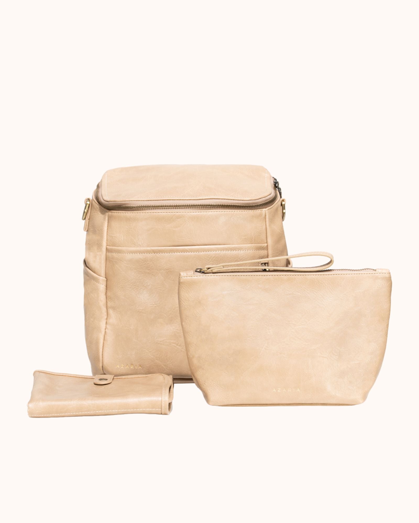 Beige diaper bag set on a white background