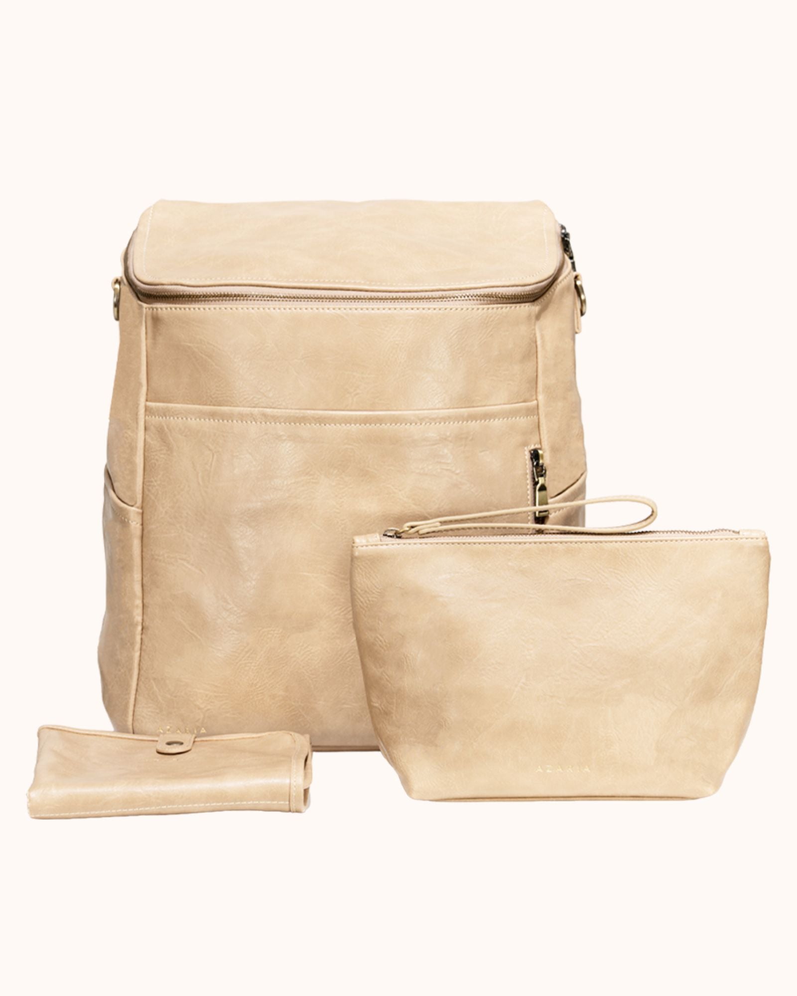 Beige leather backpack with matching pouch on a white background