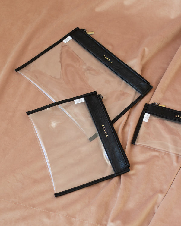 <span data-behavior="variable-product_title" data-variant_id='43339213996277'>Clear Clutch Small
</span>