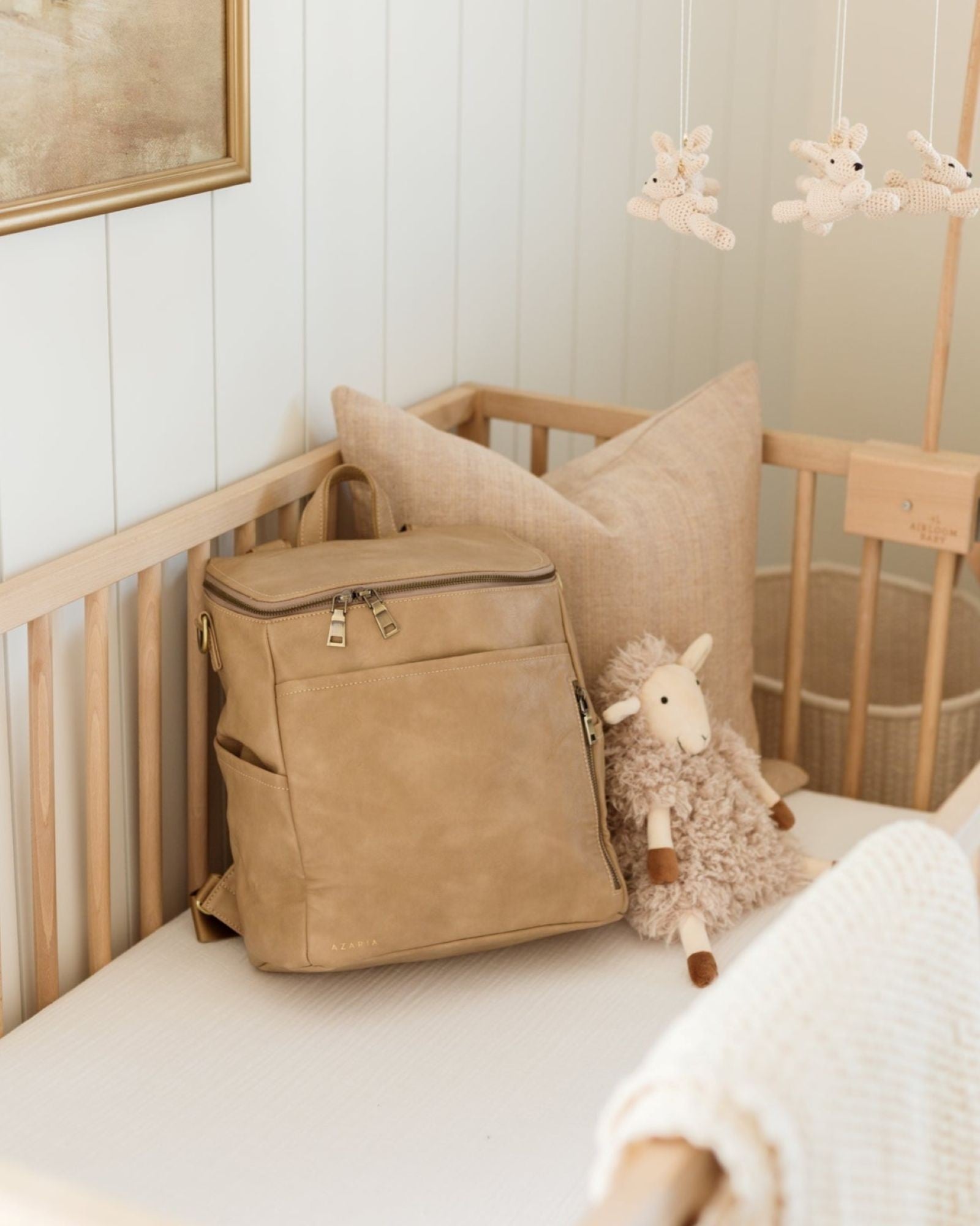 Diaper bag packed with hospital bag essentials for mom and baby