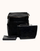 Black leather bag set with a wallet on a white background