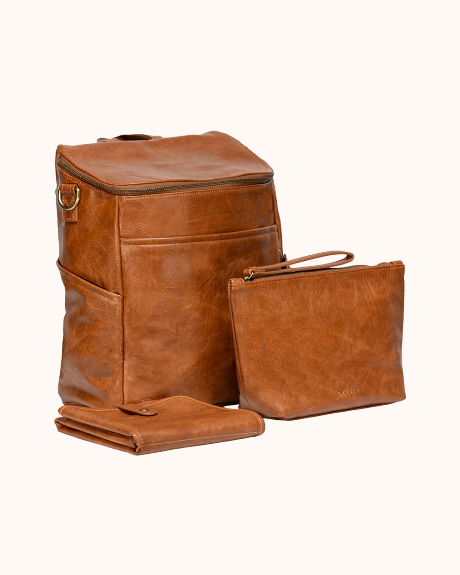 Brown leather backpack and pouch on a white background