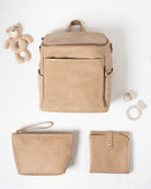 Beige vegan backpack and pouches on a white background with baby items.