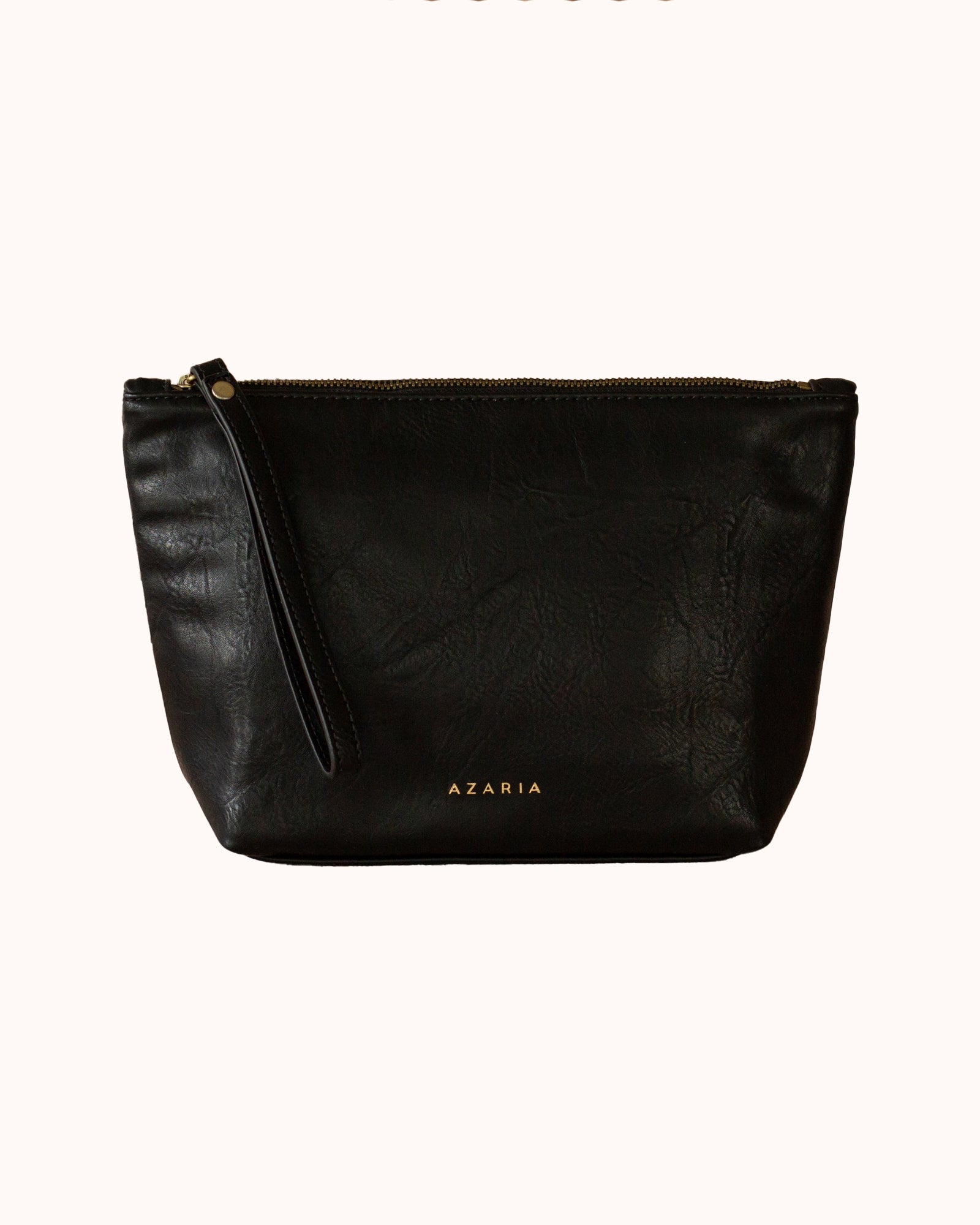 Black vegan leather insulated snack pouch with a strap on a white background
